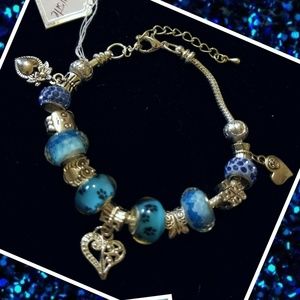 Item 28 * Silver European Charm Bracelet w Charms